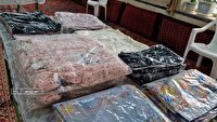 توزیع بسته های پوشاک و کفش بین خانواده های کم برخوردار مهدیشهر
